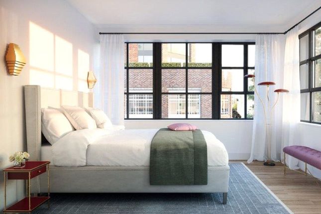 Whitfield Street Residences bedroom with large windows